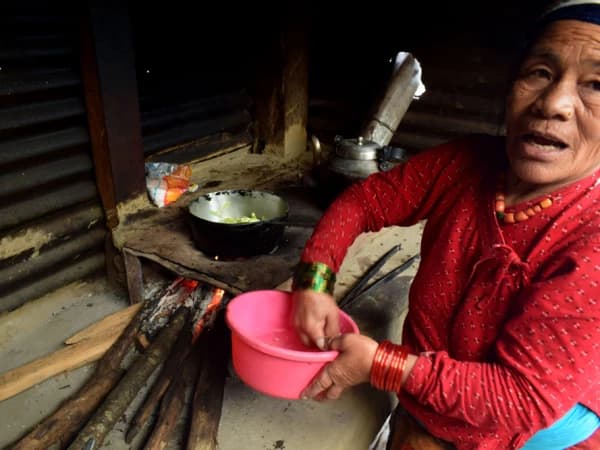 A Local Lady Prepares Lunch In Mardi Himal Trekking Route